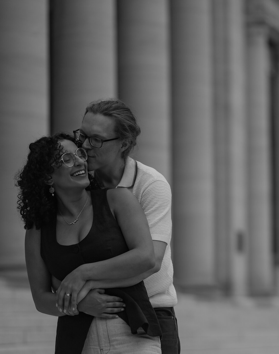 Couple portrait, black and white columns