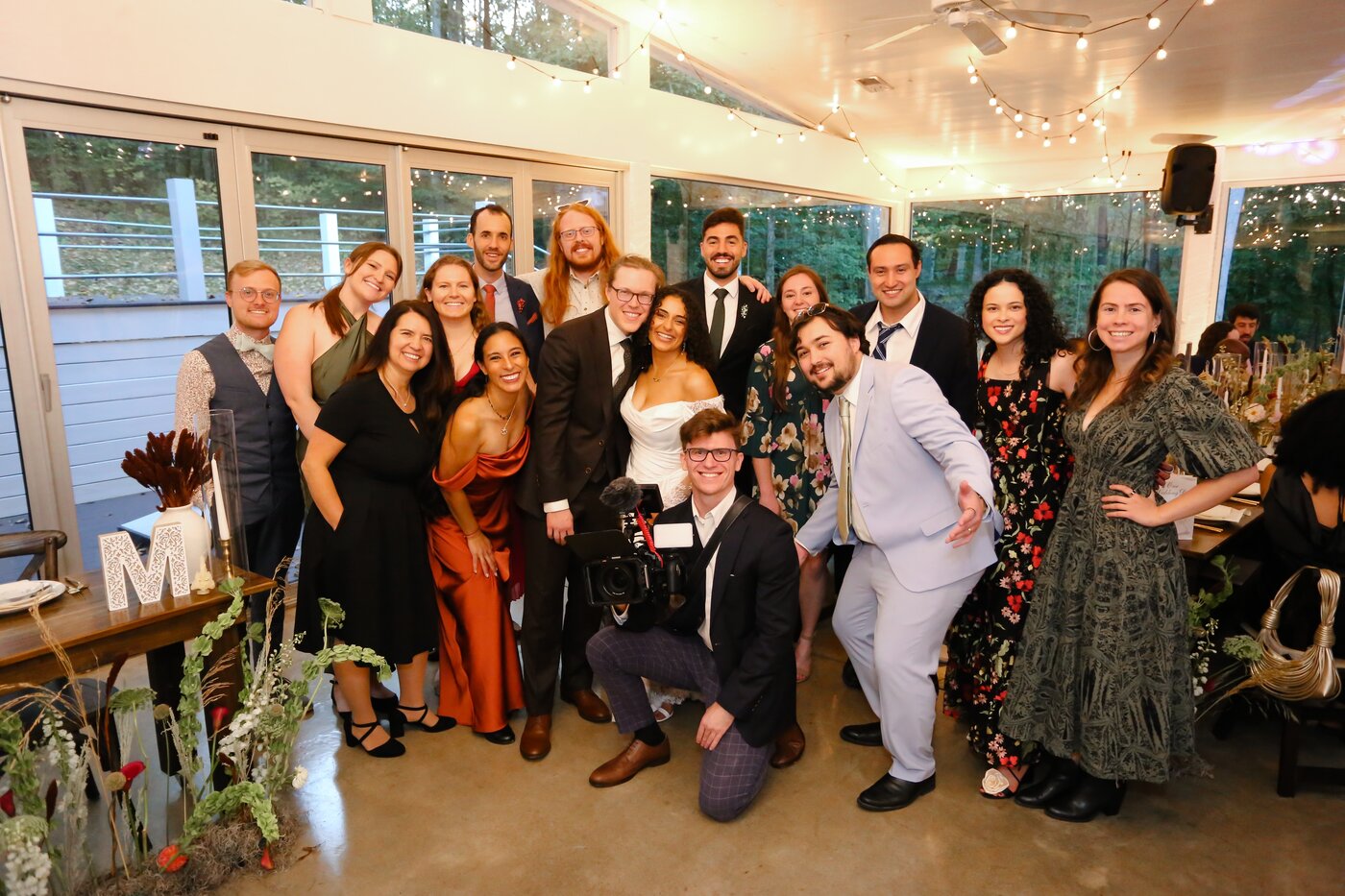 Wedding group photo with camera gear